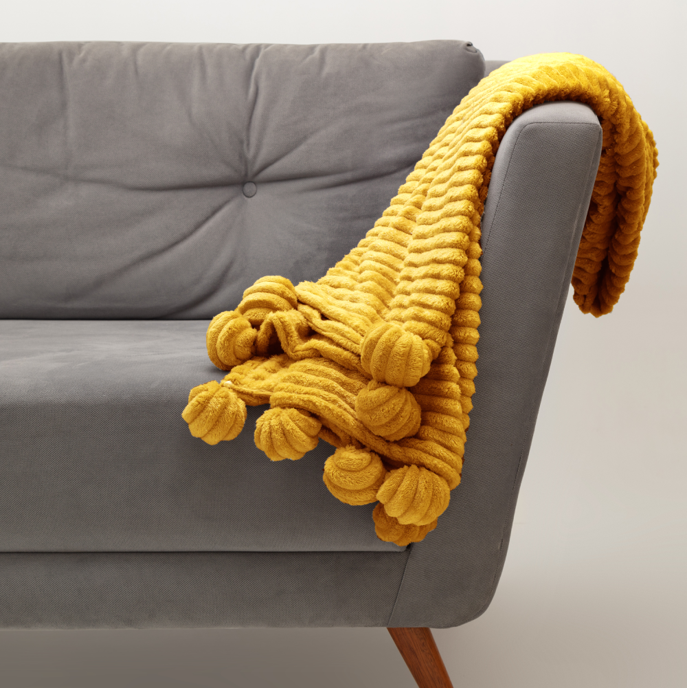 Cobija de siesta pompón